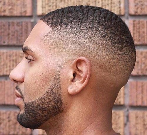 Bald fade with waves haircut