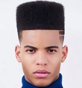 young black man with high top fade haircut