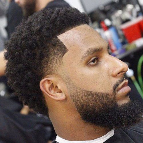 black male with a low drop fade and edge up