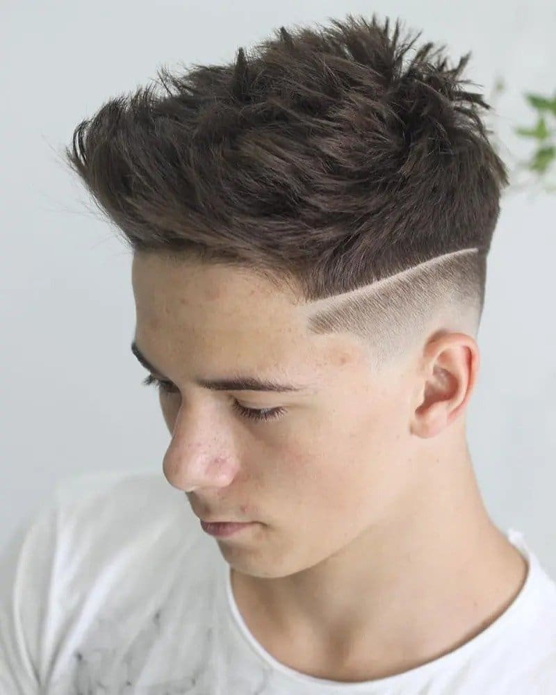 Undercut Fade With Hard Part And Textured Spikes men haircut